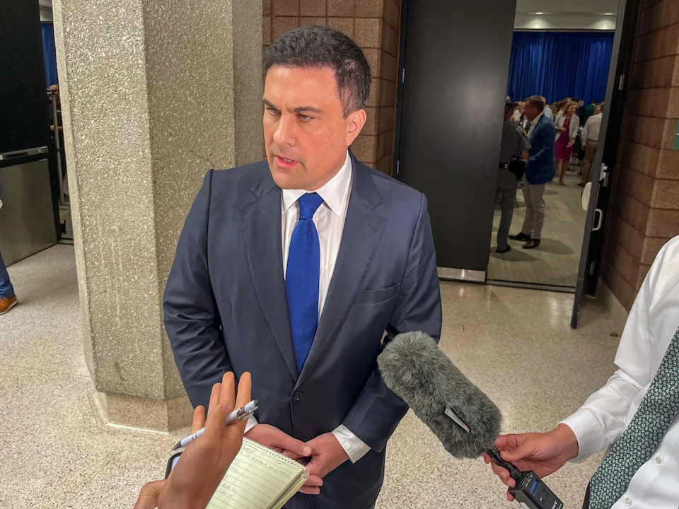  GOP Senate candidate Nate Morris takes questions from the Media following the Kentucky Farm Bureau Country Ham Breakfast. (Kentucky Lantern photo by McKenna Horsley)