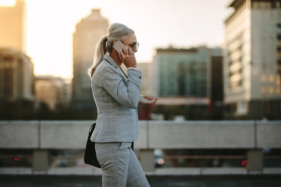 STOCK PHOTO/Adobe - PHOTO: People walk in a city in an undated stock photo.