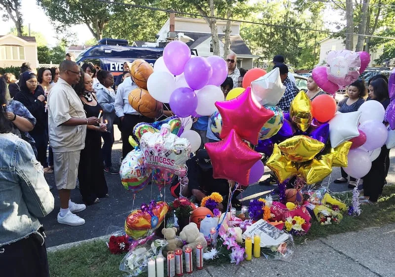 Family members, friends and community members gather for a vigil, Sept. 15, 2016, in Brentwood, N.Y., at a memorial near the scene where teens Nisa Mickens and Kayla Cuevas were found dead. A member of the violent MS-13 street gang pleaded guilty Thursday, Aug. 31, 2023, for his part in the murders of four people, including the two teenage girls who were attacked with a machete and baseball bats as they walked through their suburban Long Island neighborhood. | Mike Balsamo, Associated Press