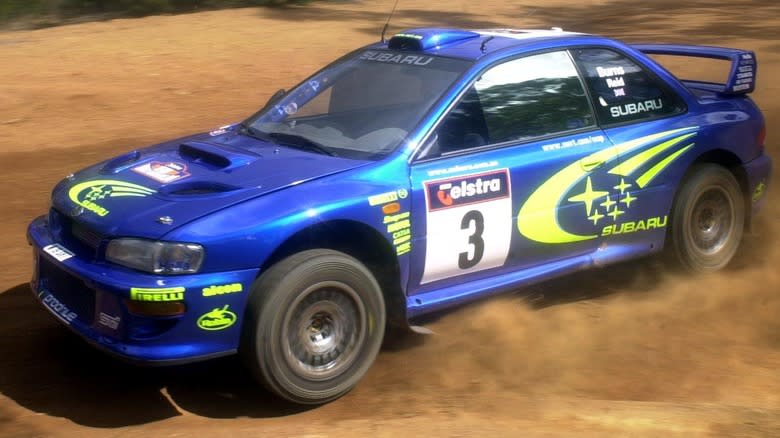 Richard Burns in the Subaru Impreza WRX through stage one of the 2000 Rally Australia