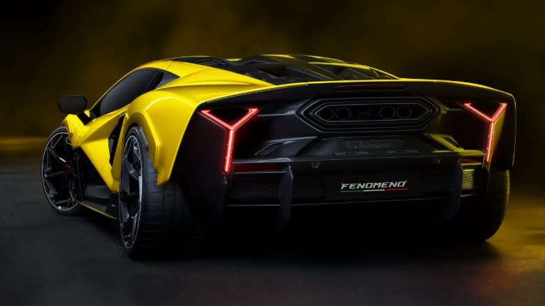 Rear 3/4 view of a yellow Lamborghini Fenomeno