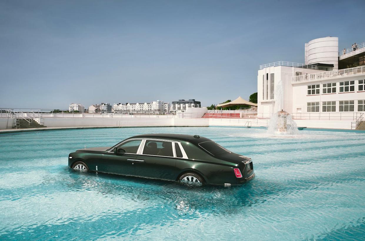 rolls royce phantom in a swimming pool