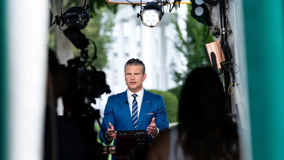 Defense Secretary Pete Hegseth speaks during a TV interview outside the White House in Washington, DC, on Thursday. - Eric Lee/Bloomberg/Getty Images