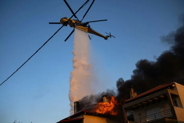 One of the worst wildfires was just north of Athens, where firefighting aircraft and other units were deployed (Angelos TZORTZINIS)