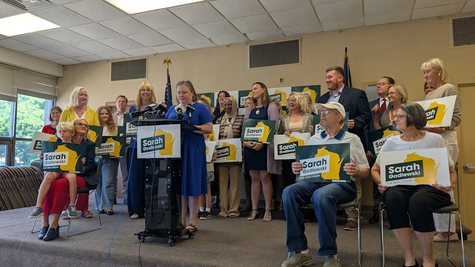  Former Democratic Lt. Gov. Barbara Lawton, the first female to hold the office in Wisconsin, and several Democratic state legislators, including state Rep. Jodi Emerson (D-Eau Claire), at the podium, were also at Sec. of State Sarah Godlewski’s announcement. (Photo by Baylor Spears/Wisconsin Examiner)