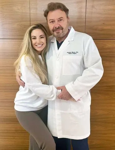 Courtesy of Ashley Alexiss Dr. Nicholas Nikolov and Ashley Alexiss.