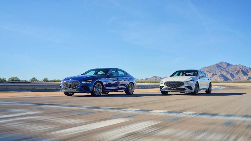 Front 3/4 shot of a blue and gray 2025 Genesis G70 racing on a dragstrip.