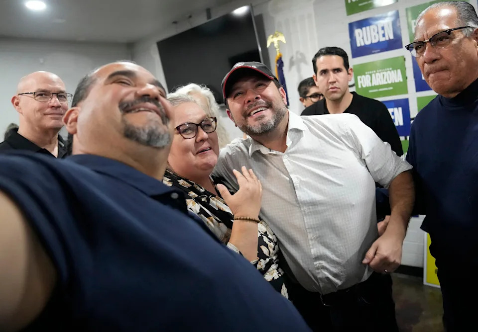 U.S. senator-elect Ruben Gallego, D-Ariz., poses for photos after a news conference at the American Legion Post 65 after defeating Republican Kari Lake.