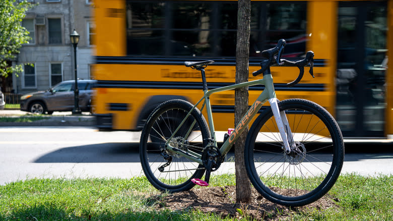 A green and white bicycle on a trail in New York City