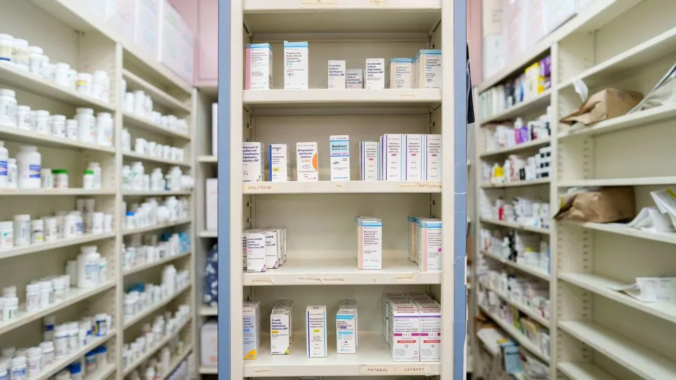 Medications are stored on shelves at a pharmacy on May 12 in Los Angeles. In May, Trump signed an executive order aimed at reducing the cost of prescription drugs and pharmaceuticals. - Eric Thayer/Getty Images/File
