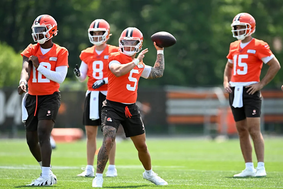 BEREA, OHIO - JUNE 11: Dillon Gabriel #5 of the Cleveland Browns throws a pass as Shedeur Sanders #12, Kenny Pickett #8 and Joe Flacco #15 look on during Cleveland Browns mandatory minicamp at CrossCountry Mortgage Campus on June 11, 2025 in Berea, Ohio. (Photo by Nick Cammett/Getty Images)
