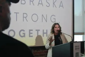 Nebraska Democratic Party Chair Jane Kleeb speaking at Eric Moyer’s kickoff event on Aug 14. 2025. (Juan Salinas II/Nebraska Examiner)