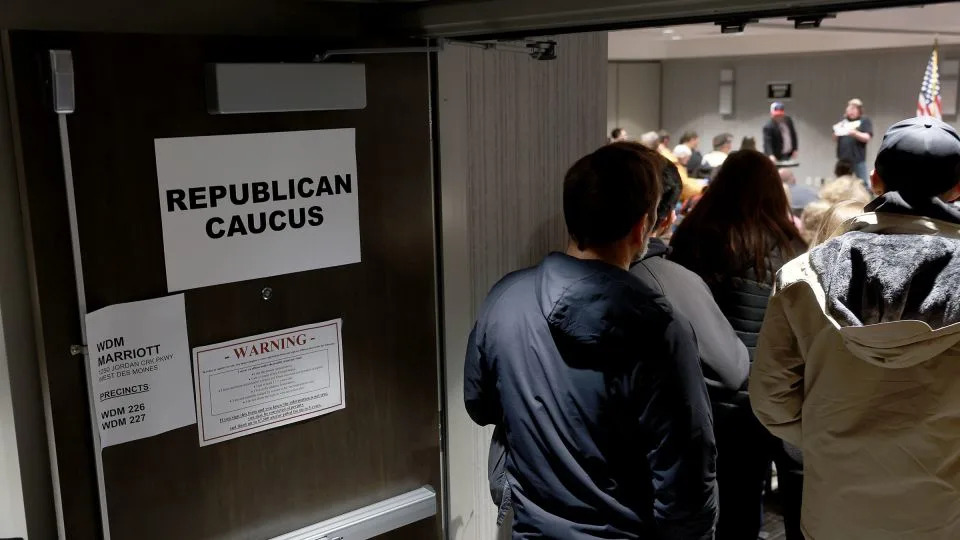 A crowd attends their Republican caucus on January 15, 2024, in West Des Moines, Iowa. - Joe Raedle/Getty Images