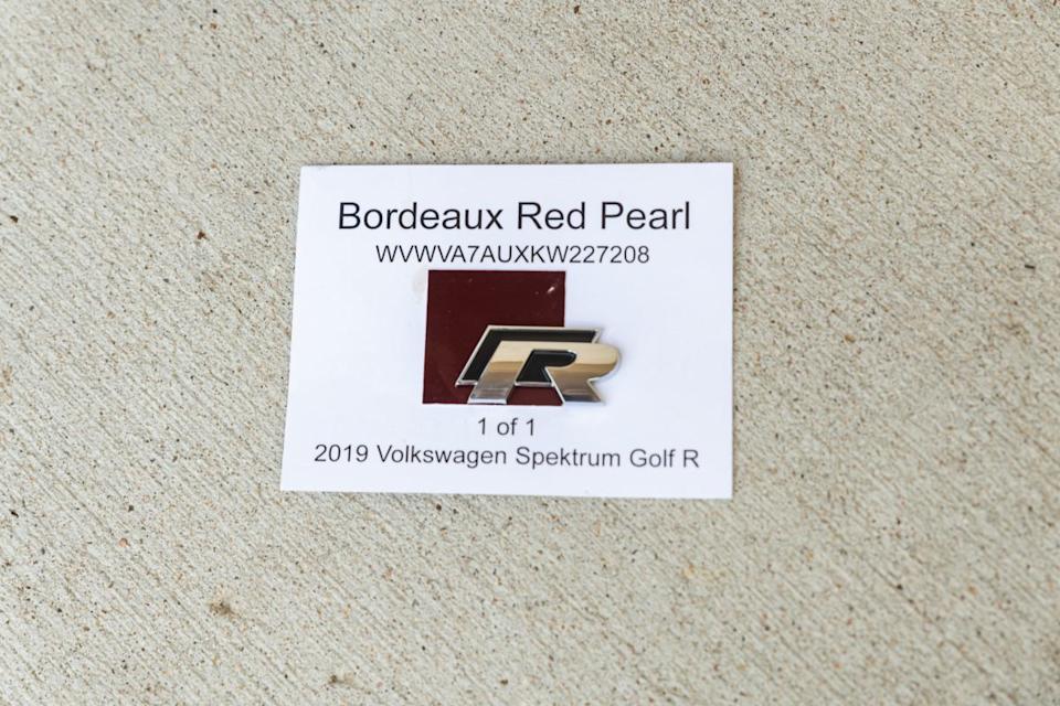 Included paint chip and postcard for 2019 Golf R SpektrumBring a Trailer