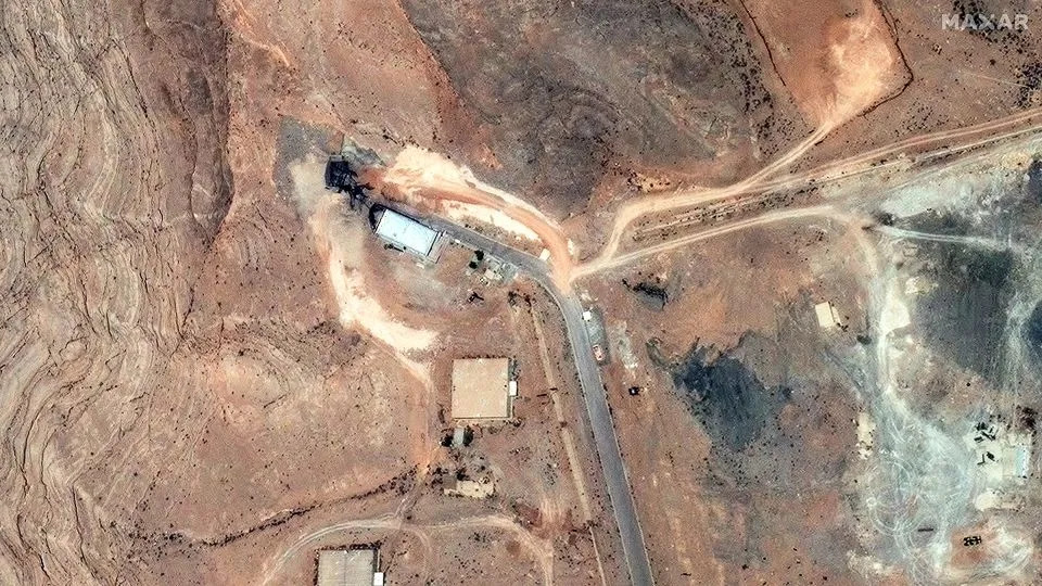 A satellite image shows damage to the tunnel entrances of the Isfahan Nuclear Technology Research Center in Isfahan, Iran, on June 22. - Maxar Technologies/Reuters