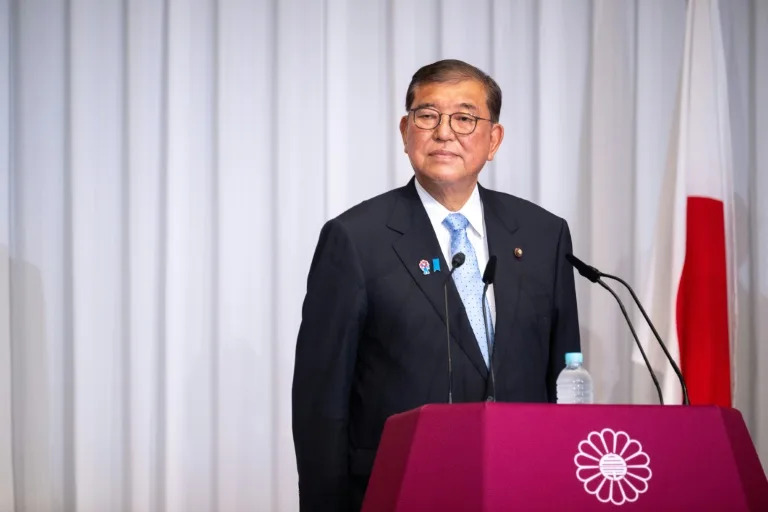 Japanese Prime Minister Shigeru Ishiba's future is uncertain but an unlikely campaign for him to stay was growing online on Friday (Philip FONG)