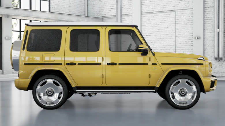 Side view of a yellow Mercedes-AMG G63