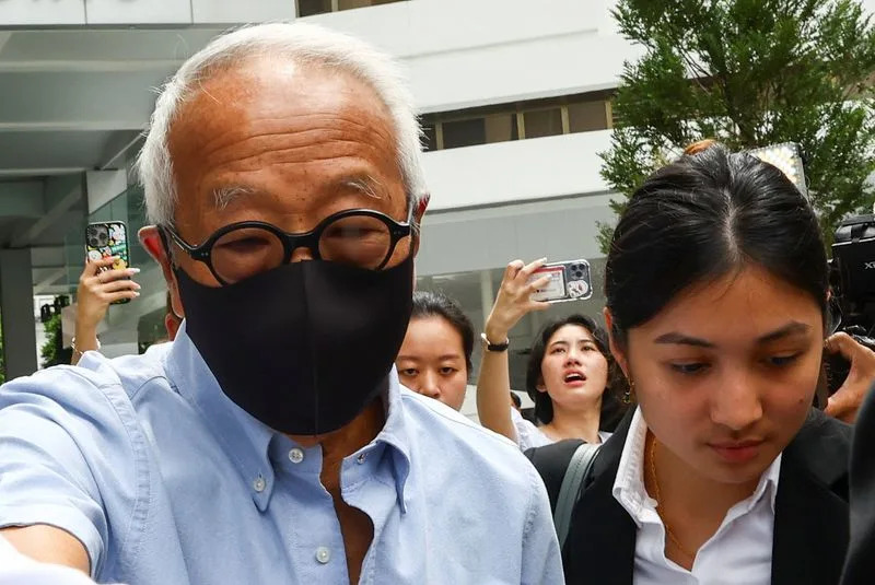 Singapore property tycoon linked to jailed minister pleads guilty