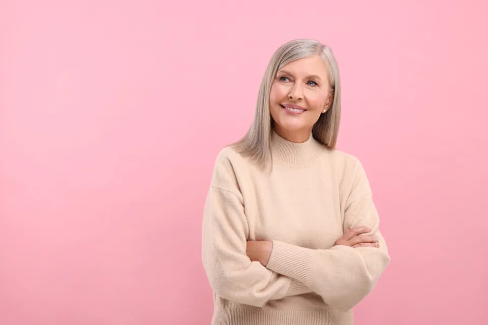 Woman looking happy and patient.