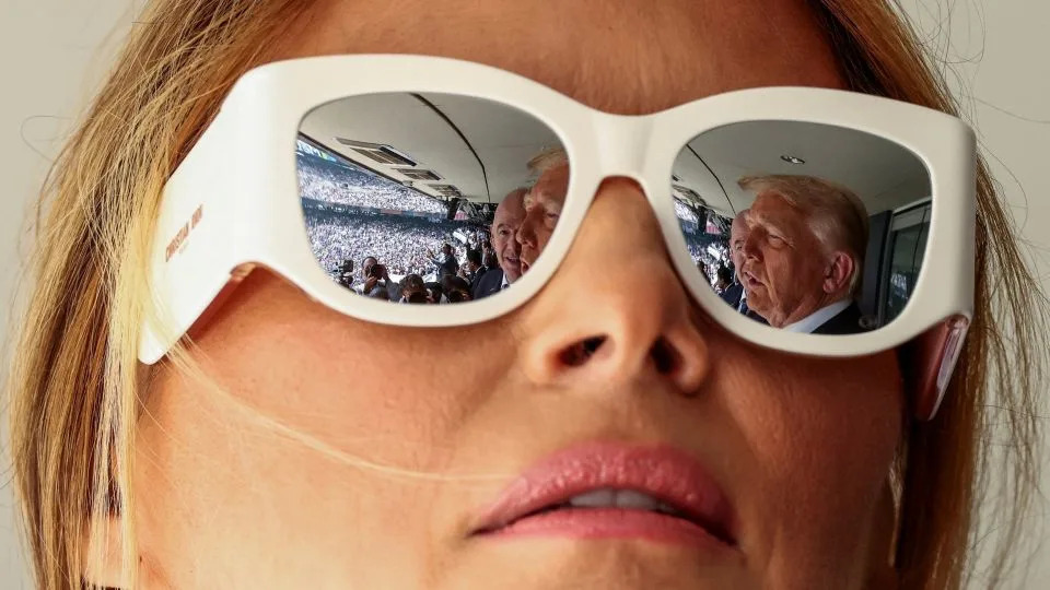 President Donald Trump and FIFA president Gianni Infantino are reflected on first lady Melania Trump's glasses, as they attend the FIFA Club World Cup final at the MetLife Stadium in East Rutherford, New Jersey on July 13. - Kevin Lamarque/Reuters