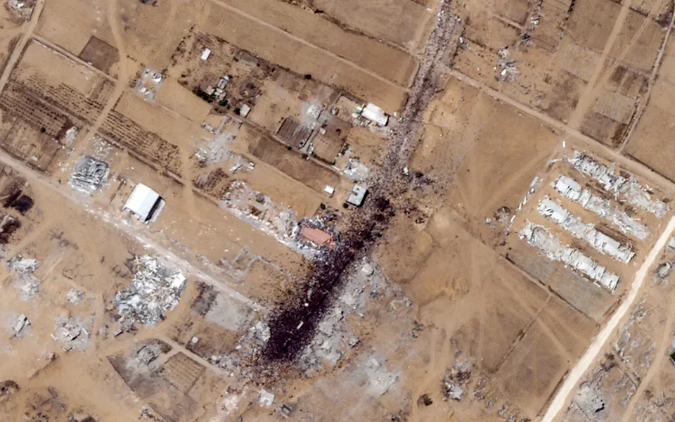 Starving Palestinians gathered around a distribution site affiliated with the Gaza Humanitarian Foundation in Khan Younis