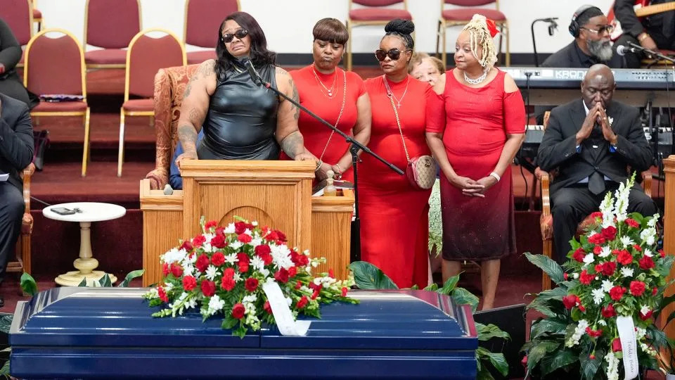 DeAsia Harmon speaks at the funeral for her husband D&#39;Vontaye Mitchell on, July 11, 2024, in Milwaukee. Mitchell died June 30, 2024, after an incident at a hotel. - Morry Gash/AP