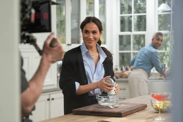 Jake Rosenberg/Netflix Meghan Markle and Tan France in Season 2 of Netflix's 'With Love, Meghan'