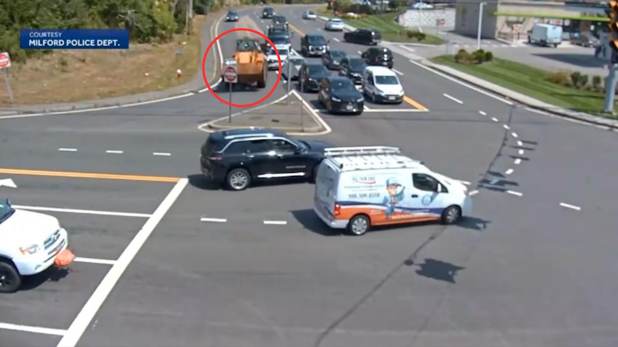 Watch: Out-Of-Control Front Loader Barrels Through Busy Intersection