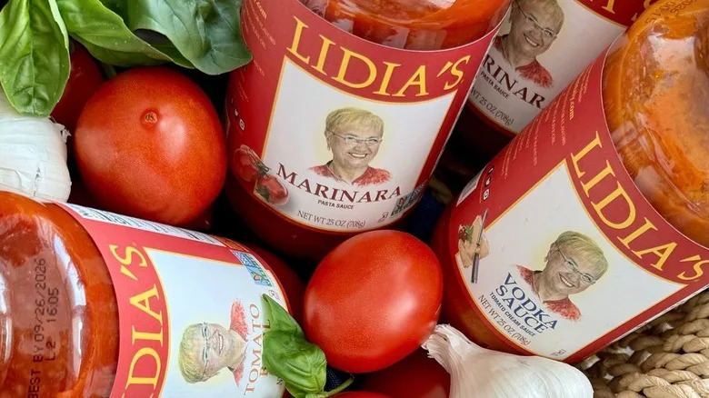 Basked of Lidia's sauces with basil, garlic, and tomatoes