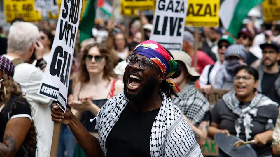 People chant slogans during the "Stand with Gaza" protest at Bryant Park in New York on August 16, 2025.