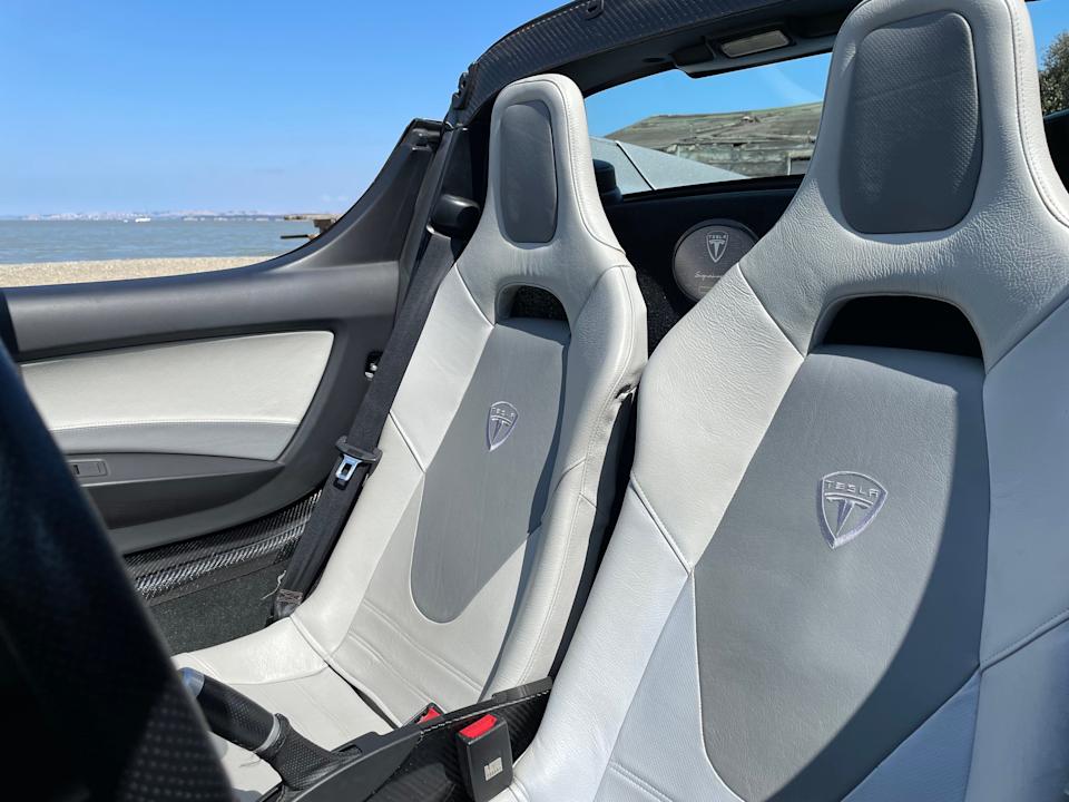 two seats in a 2008 Tesla Roadster