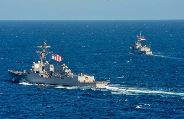 Venezuela deploys warships, drones as US destroyers draw near