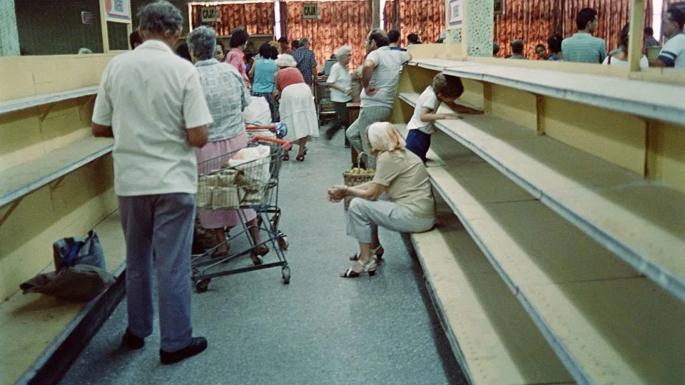 In a scene typical of Cuba's "Special Period" after the fall of the USSR, a Havana supermarket's shelves are bare in 1991. - Omar Torres/AFP via Getty Images