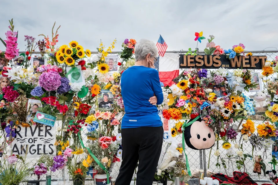 Brandon Bell/Getty Images - PHOTO: A person pays their respects at a memorial honoring the lives lost in the flash floods that claimed more than 120 lives on July 13, 2025 in Kerrville, Texas.