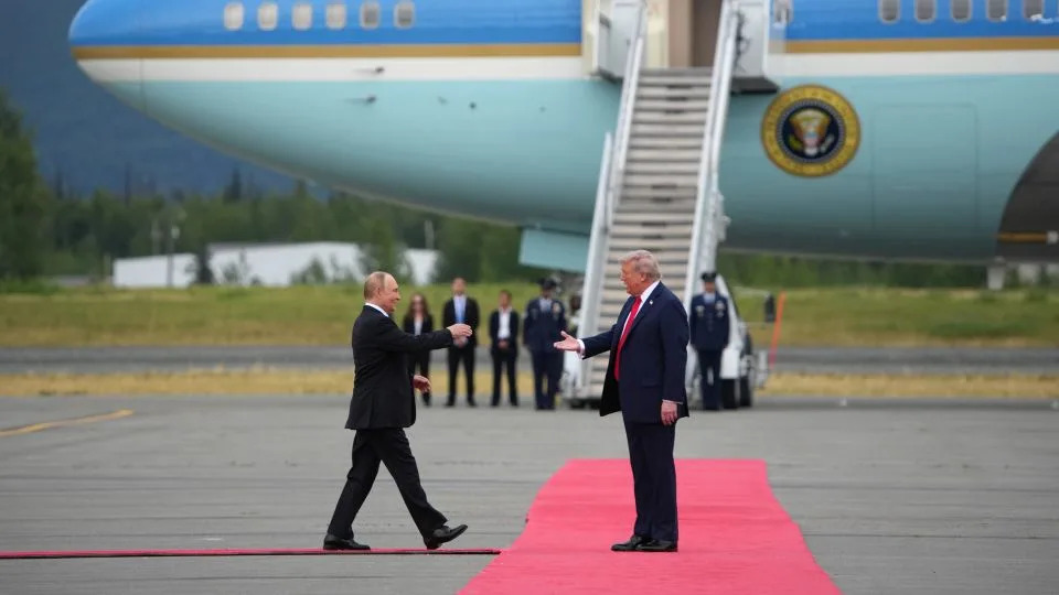 President Trump greets President Putin as he arrives at Joint Base Elmendorf-Richardson in Anchorage, Alaska, for talks on Ukraine on Friday. - Andrew Harnik/Getty Images