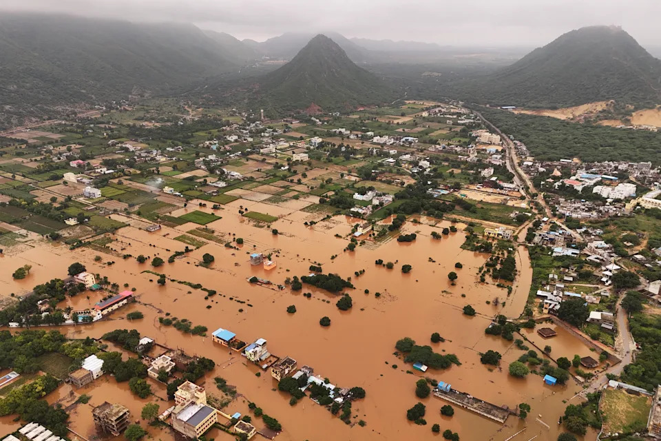 An aerial view shows buildings partially submerged in floodwater after heavy monsoon rains in Pushkar, Rajasthan state, India, July 19, 2025. / Credit: HIMANSHU SHARMA/AFP/Getty