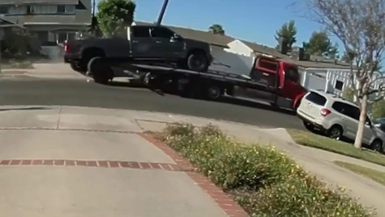 Sloppy Tow Truck Drops Pickup And Keeps Going
