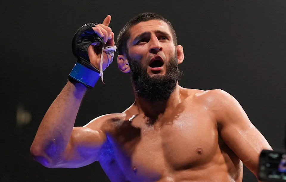 Khamzat Chimaev of the United Arab Emirates, celebrates after he beats Kamaru Usman of Nigeria, in the UFC middleweight championship fight at the Ethihad Arena in Abu Dhabi, United Arab Emirates, Saturday, Oct. 21, 2023. (AP Photo/Kamran Jebreili)