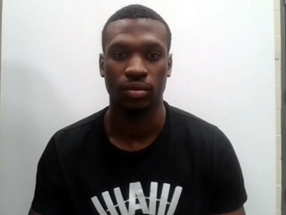 Jon Luke Evans, a Jamaican national who is a reserve officer at the Old Orchard Beach Police Department, was arrested July 25 after he attempted to purchase a firearm for his police work after his visa expired, ICE said in a statement. (ICE)
