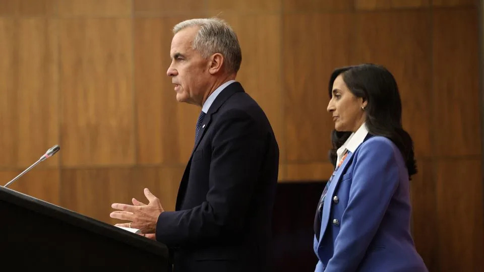 Canadian Prime Minister Mark Carney speaks, alongside Foreign Affairs Minister Anita Anand, during a press conference at the National Press Theatre in Ottawa, Ontario, Canada on Wednesday, following a Cabinet meeting. - Dave Chen/AFP/Getty Images