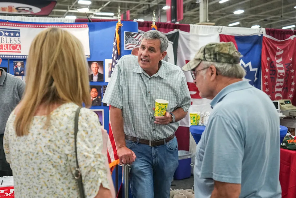 Republican candidate for governor Bill Berrien, center, of Whitefish Bay, speaks to supporters at the Wisconsin State Fair on August 6, 2025 in West Allis, Wisconsin.