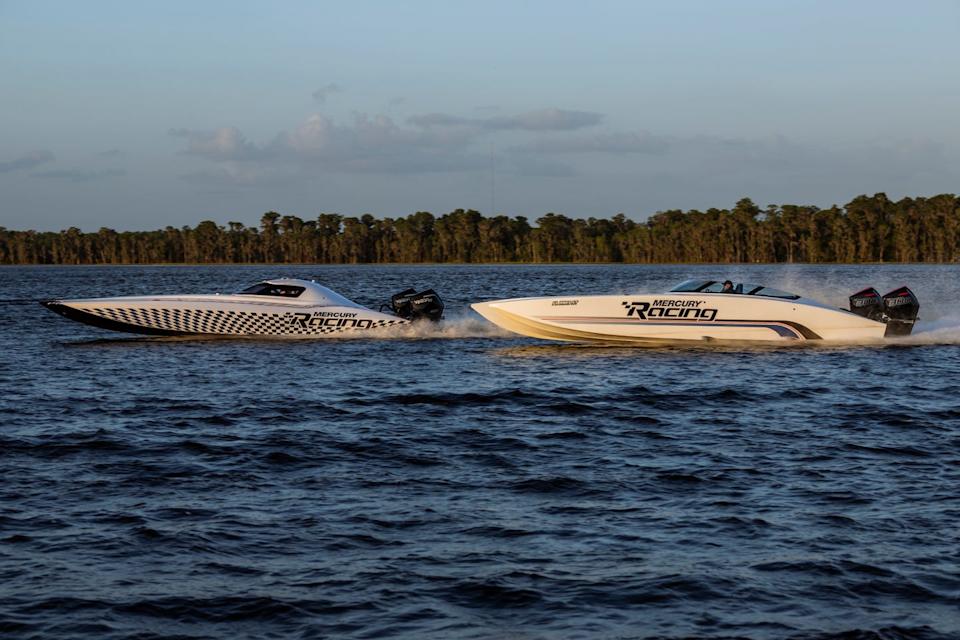 two race boats on a lake