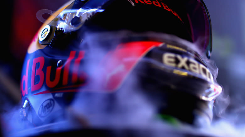 An F1 driver's helmet being cooled with dry ice.