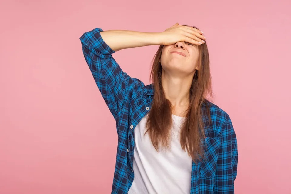 Woman frustrated that she can't concentrate.