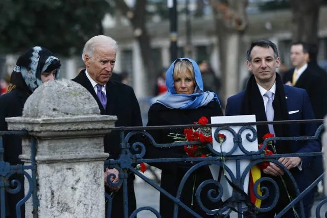 MURAD SEZER/POOL/AFP via Getty Naomi Biden, Joe Biden, Jill Biden and Howard Krein pay tribute to the victims of an Istanbul bombing on Jan. 22, 2016