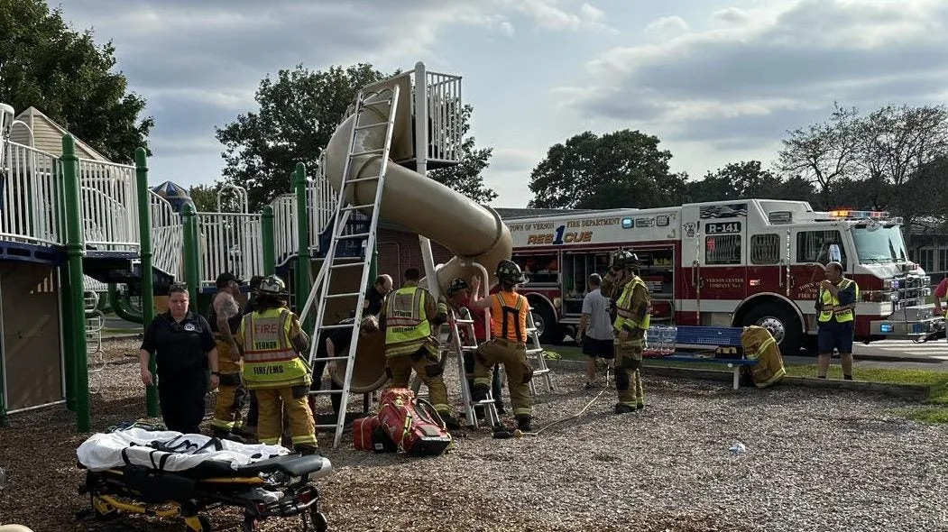 See it: Connecticut man freed from enclosed playground slide in sweltering heat