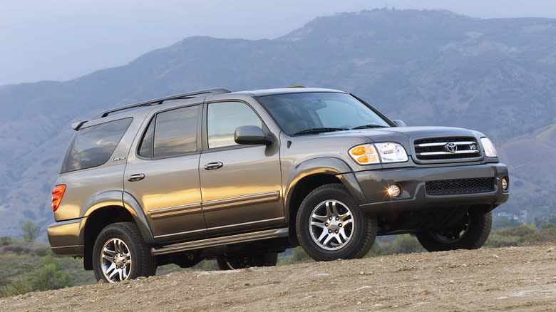toyota sequoia parked in front of some trees