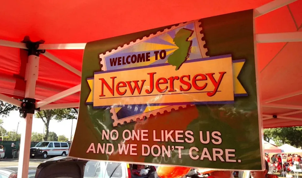 Welcome to New Jersey sign with humorous text: "No one likes us and we don't care"