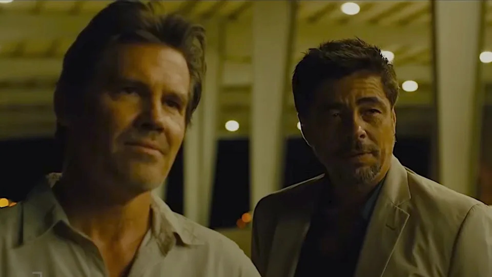 Josh Brolin and Benicio Del Toro looking smug in Sicario (2015).