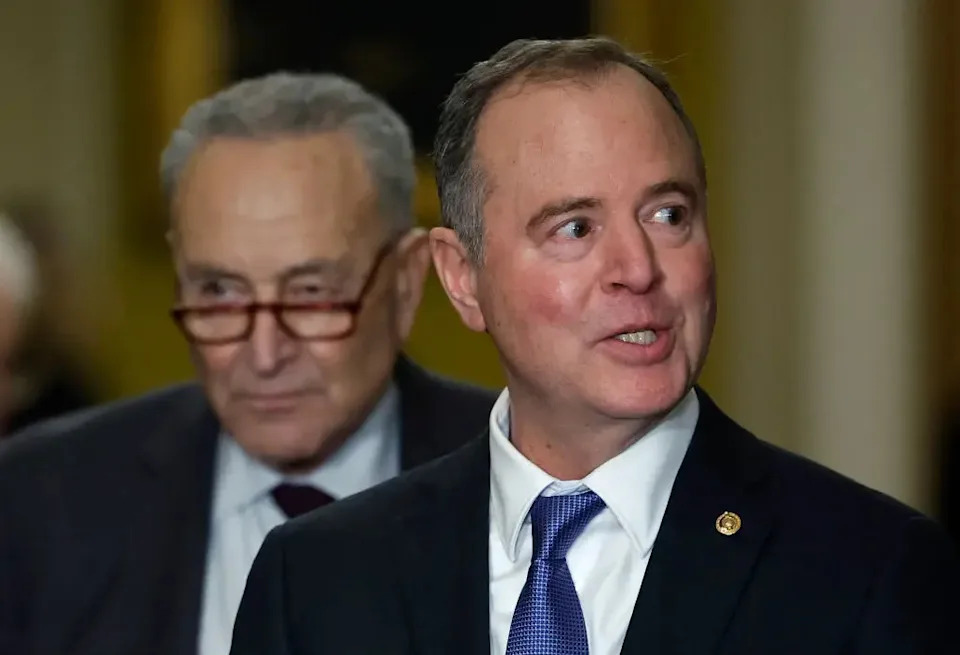 Sen. Adam Schiff (D-Calif.), right, joined by Senate Majority Leader Chuck Schumer (D-N.Y.), speaks during a news conference following the weekly Senate Democratic policy luncheon at the U.S. Capitol Dec. 10, 2024.